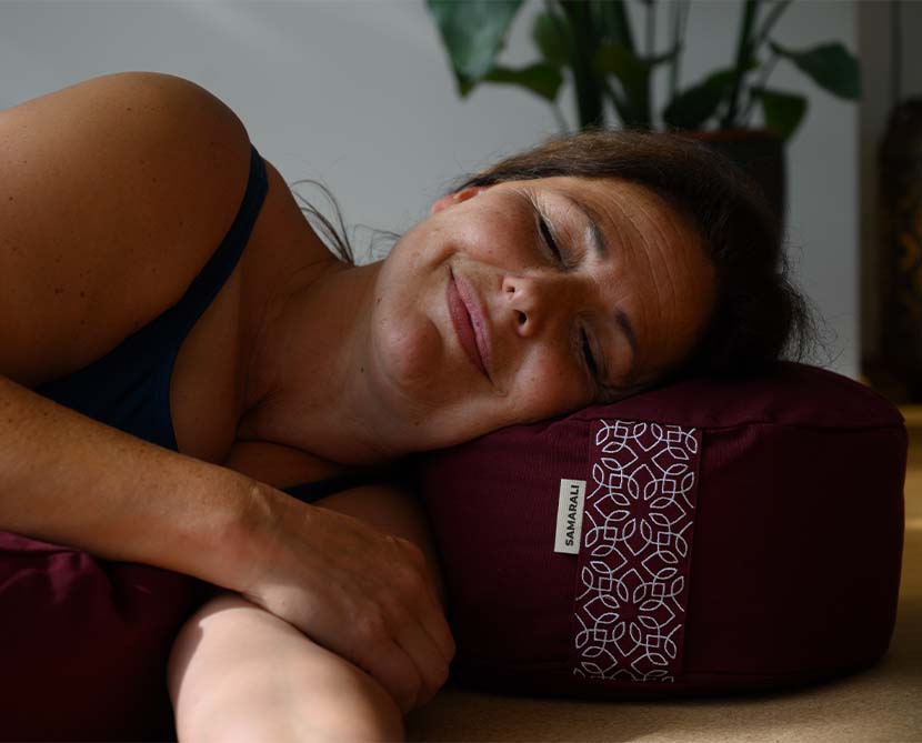 Restorative yoga with cushions and bolsters